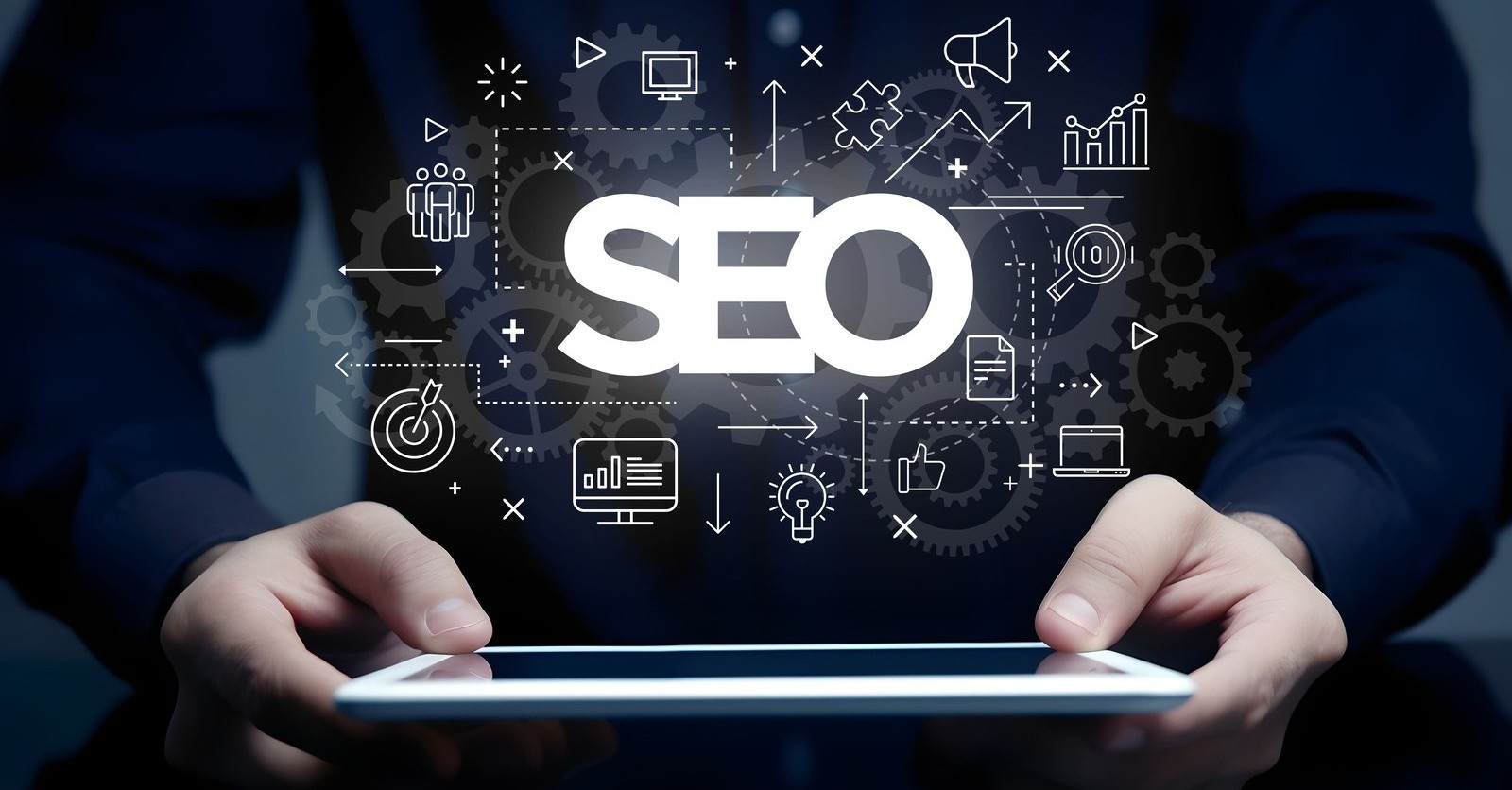 man holding tablet with seo graphic